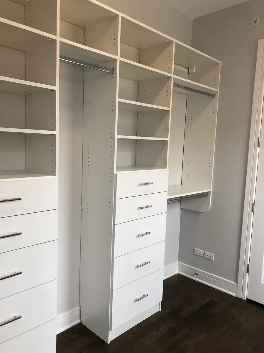 White Walk-In with Full Shelving Wall